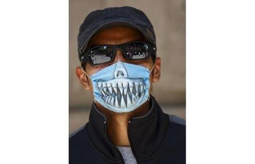 ae3a/1241408375-504x_flu-mask-teeth_1393637i_1_.jpg